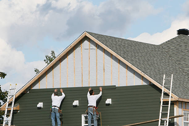 Professional Siding technician working in Highland Park, TX
